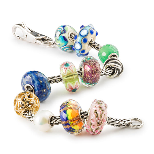 Peoples uniques winners of 2023 of a bracelet with other beads: Ocean Oysters, Spring Provence, Violet Sky, Pink Flower, Rainbow Facet, Boccioli Rosa 